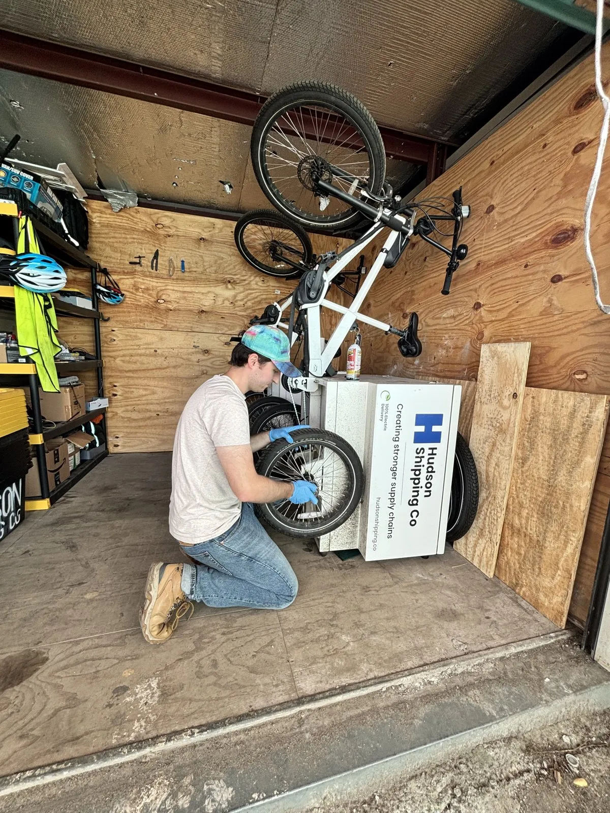 Founder and CEO Andre Debuisne servicing a Hudson Shipping Co cargo bike